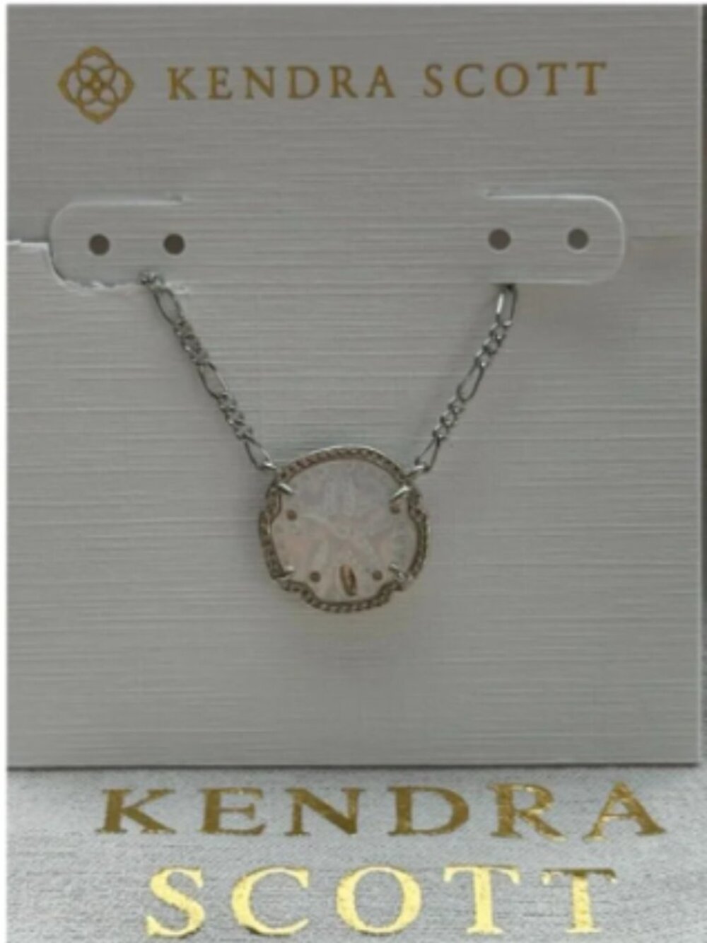Report Kendra Scott necklace